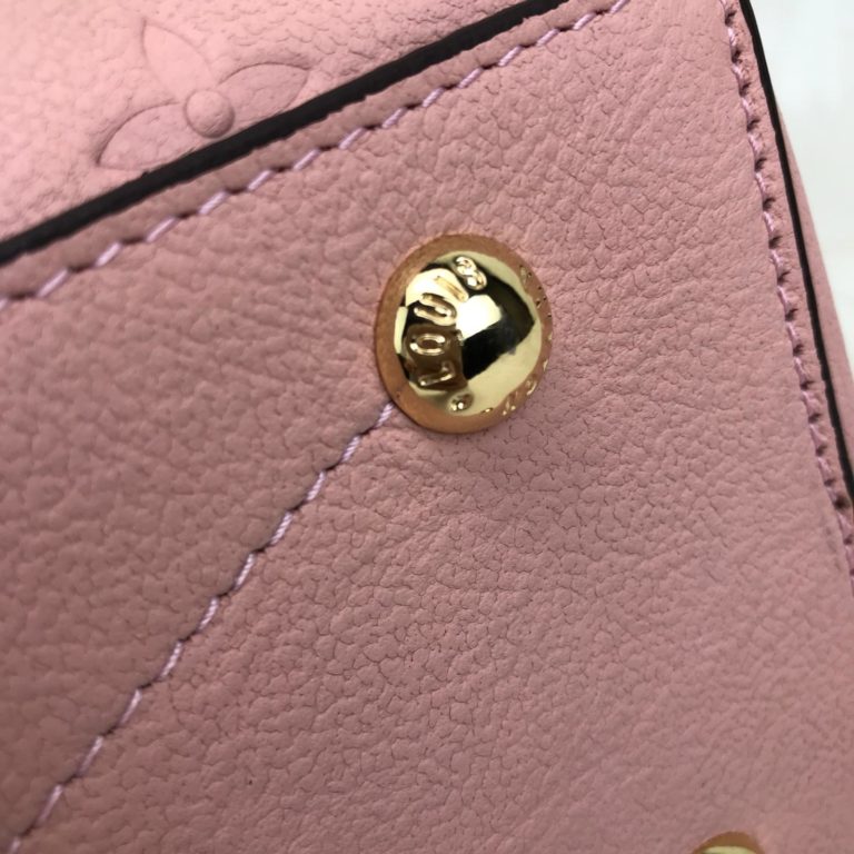 louis vuitton canta Montaigne MM Empreinte pudra pembe 33x23x15