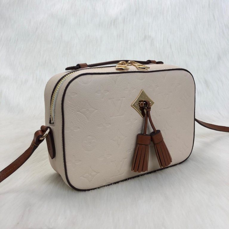 louis vuitton canta saintonge empriente krem taba 22x16x8