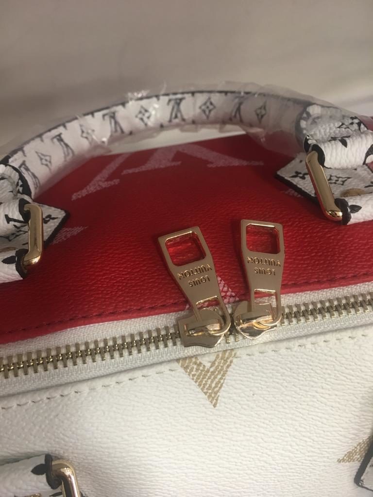 louis vuitton canta suni deri speedy monogram kirmizi beyaz buyuk logo 30cm cift tarafli