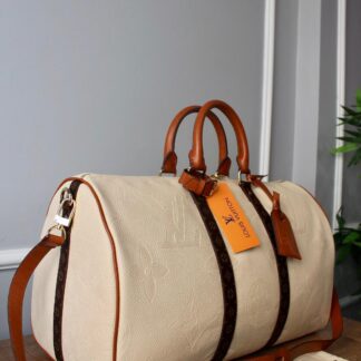 louis vuitton canta keepall bandouliere krem monogram el valizi 50x29x23