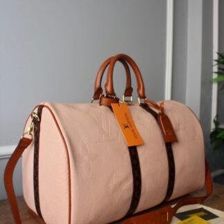 louis vuitton canta keepall bandouliere pembe logo monogram el valizi 50x29x23