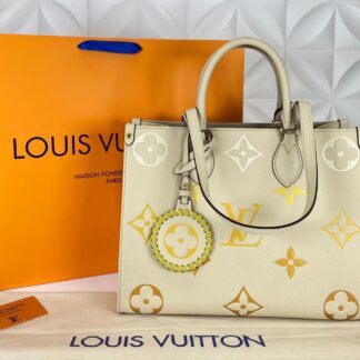 louis vuitton canta on the go mm ortaboy krem beyaz sari deri 34x26 cm