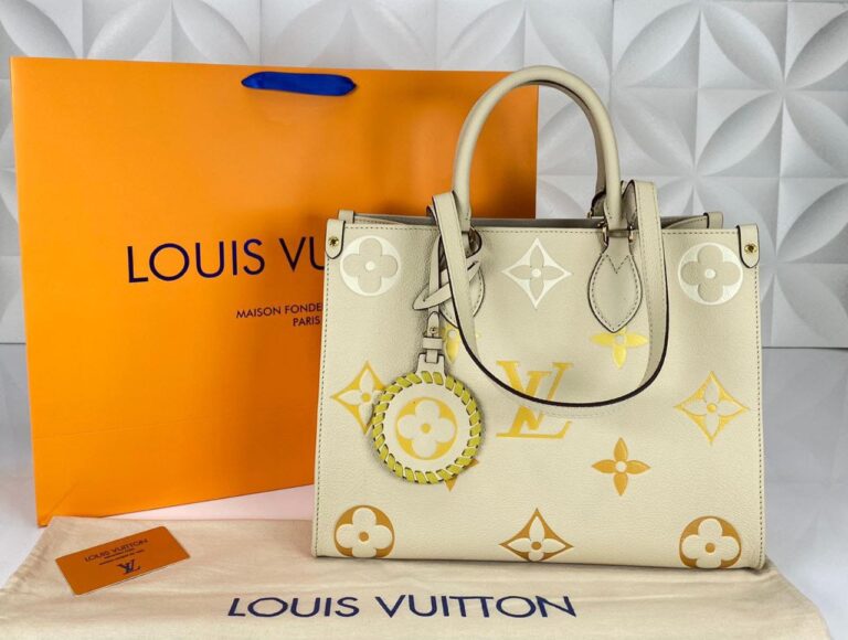 louis vuitton canta on the go mm ortaboy krem beyaz sari deri 34x26 cm