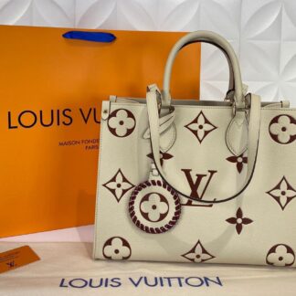 louis vuitton canta on the go mm ortaboy krem bordo deri 34x26 cm