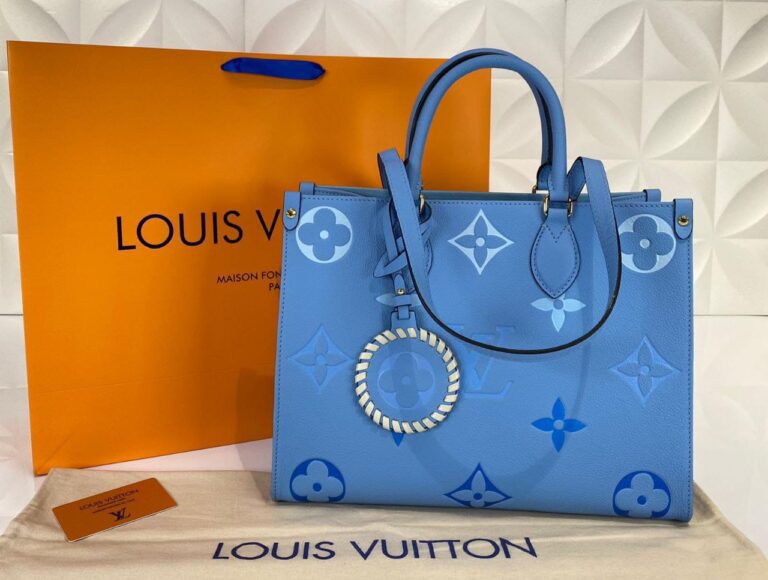 louis vuitton canta on the go mm ortaboy mavi beyaz deri 34x26 cm