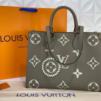 louis vuitton canta on the go mm ortaboy vizon krem deri 34x26 cm
