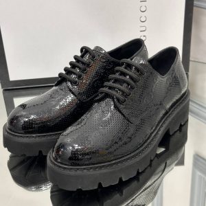 gucci ayakkabi loafer siyah kabartmali logo